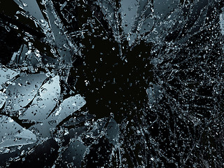 Image showing Shattered or demolished glass over black