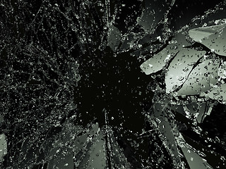 Image showing Shattered or demolished glass over black