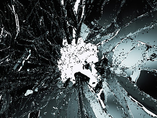 Image showing Pieces of shattered or smashed glass on white