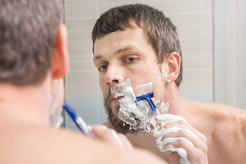 Image showing The man decided to change the image and completely shaves