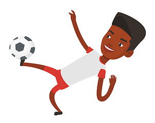 Image showing Soccer player kicking ball vector illustration.