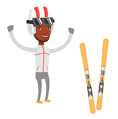 Image showing Cheerful skier standing with raised hands.