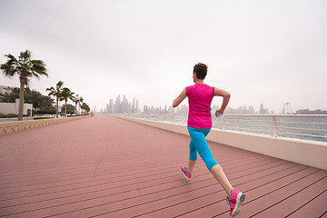 Image showing woman running on the promenade