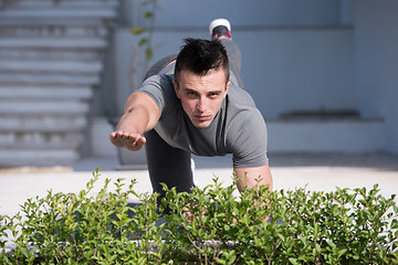 Image showing man doing morning yoga exercises