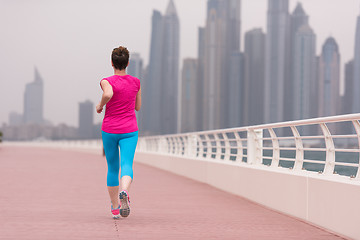 Image showing woman running on the promenade