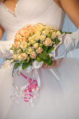 Image showing Bride holding wedding bouquet