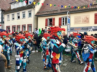Image showing Traditional carnival in South Germany - Swabian-Alemannic Fastnacht. A local group is performing traditional Guggenmusik, brass and percussion music.
