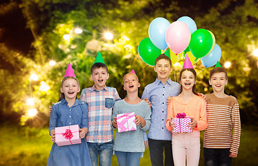 Image showing happy children with gifts at birthday party