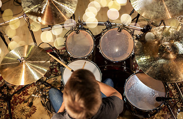 Image showing musician or drummer playing drum kit at studio