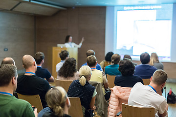 Image showing Woman giving presentation in lecture hall at university.