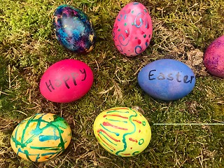 Image showing Happy Easter - Colourful Easter eggs in green moss.