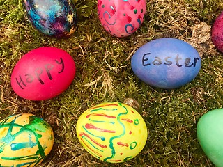 Image showing Happy Easter - Colourful Easter eggs in green moss.