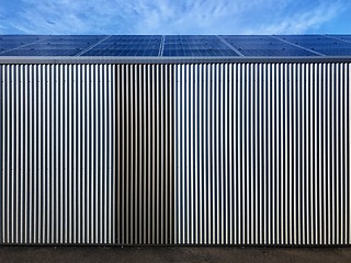 Image showing warehouse covered by solar panels