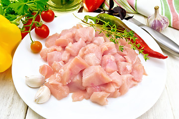 Image showing Chicken breast raw sliced in plate on board