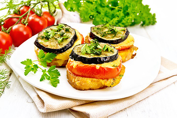 Image showing Appetizer of aubergines and cheese on napkin