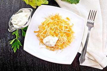 Image showing Salad of carrot and kohlrabi with sour cream on board top