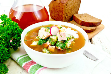 Image showing Okroshka in white bowl on towel