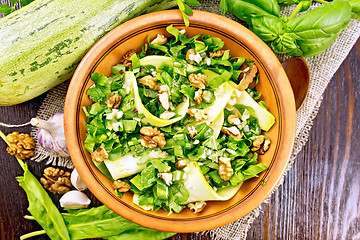 Image showing Salad with squash and sorrel on board top