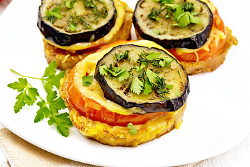 Image showing Appetizer of aubergines and cheese in plate on napkin