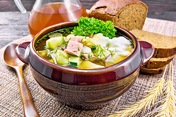 Image showing Okroshka in clay bowl on napkin