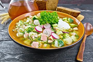 Image showing Okroshka in bowl on black board