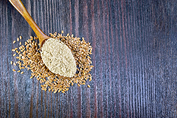 Image showing Flour flax in spoon on board top