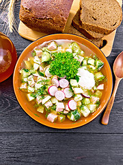 Image showing Okroshka in bowl on board top