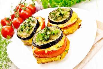 Image showing Appetizer of aubergines and cheese in plate on board