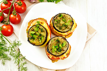 Image showing Appetizer of aubergines and cheese in plate on board top