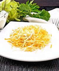 Image showing Salad of carrot and kohlrabi on board