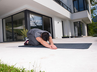 Image showing man doing morning yoga exercises