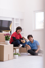 Image showing boys with cardboard boxes around them