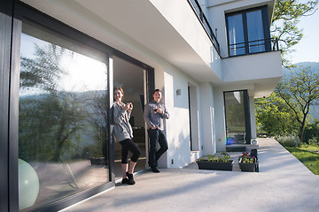 Image showing couple enjoying on the door of their luxury home villa