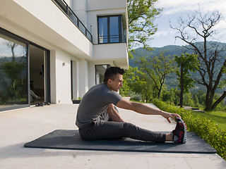 Image showing man doing morning yoga exercises