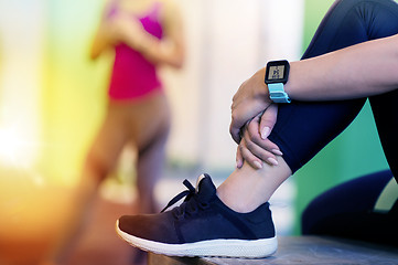 Image showing close up of woman with heart rate tracker in gym