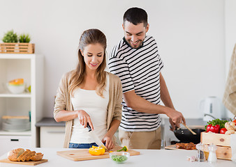 Image showing couple cooking food at home kitchen