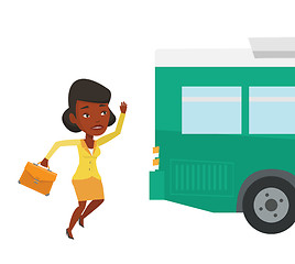 Image showing Latecomer woman running for the bus.