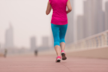 Image showing woman running on the promenade