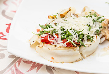 Image showing Cuttlefish with tomato, salad and Parmigiano cheese
