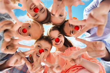 Image showing children showing peace hand sign at red nose day