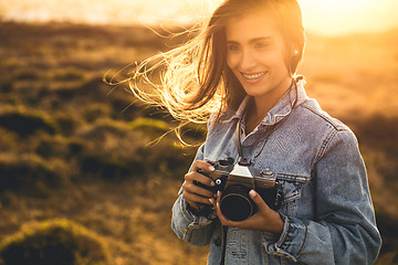 Image showing Woman Taking Picture Outdoors