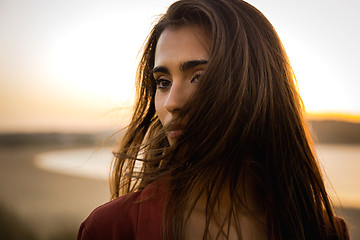 Image showing Portrait of a beautiful woman on the beach