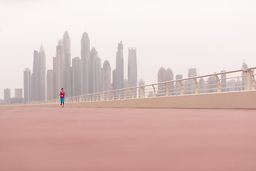 Image showing woman running on the promenade