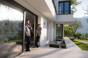 Image showing couple enjoying on the door of their luxury home villa