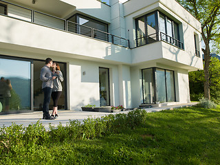 Image showing couple enjoying morning coffee