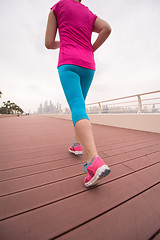 Image showing woman running on the promenade