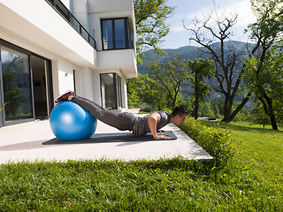 Image showing man doing morning yoga exercises