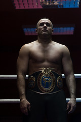 Image showing kick boxer with his championship belt