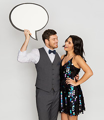 Image showing happy couple at party holding text bubble banner