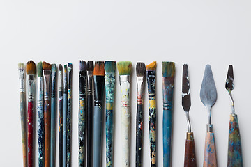 Image showing palette knives or painting spatulas and brushes